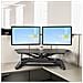 Scrivania ad angolo Sit Stand con Vassoio per Tastiera - Ampia Superficie (908x530mm) - Postazione di lavoro ergonomica per stare in piedi /seduto ad altezza regolabile - Supporta due monitor - Foto miniatura 8