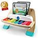 Baby Einstein Hape Magic Touch Piano, Giocattolo Musicale In Legno, Include 3 Spartiti E 6 Canzoni, A Partire Da 12 Mesi - Foto miniatura 1