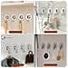 Set Di 4 Ganci Adesivi Forti Senza Trapano - Appendere Senza Danni Silver - Foto miniatura 2
