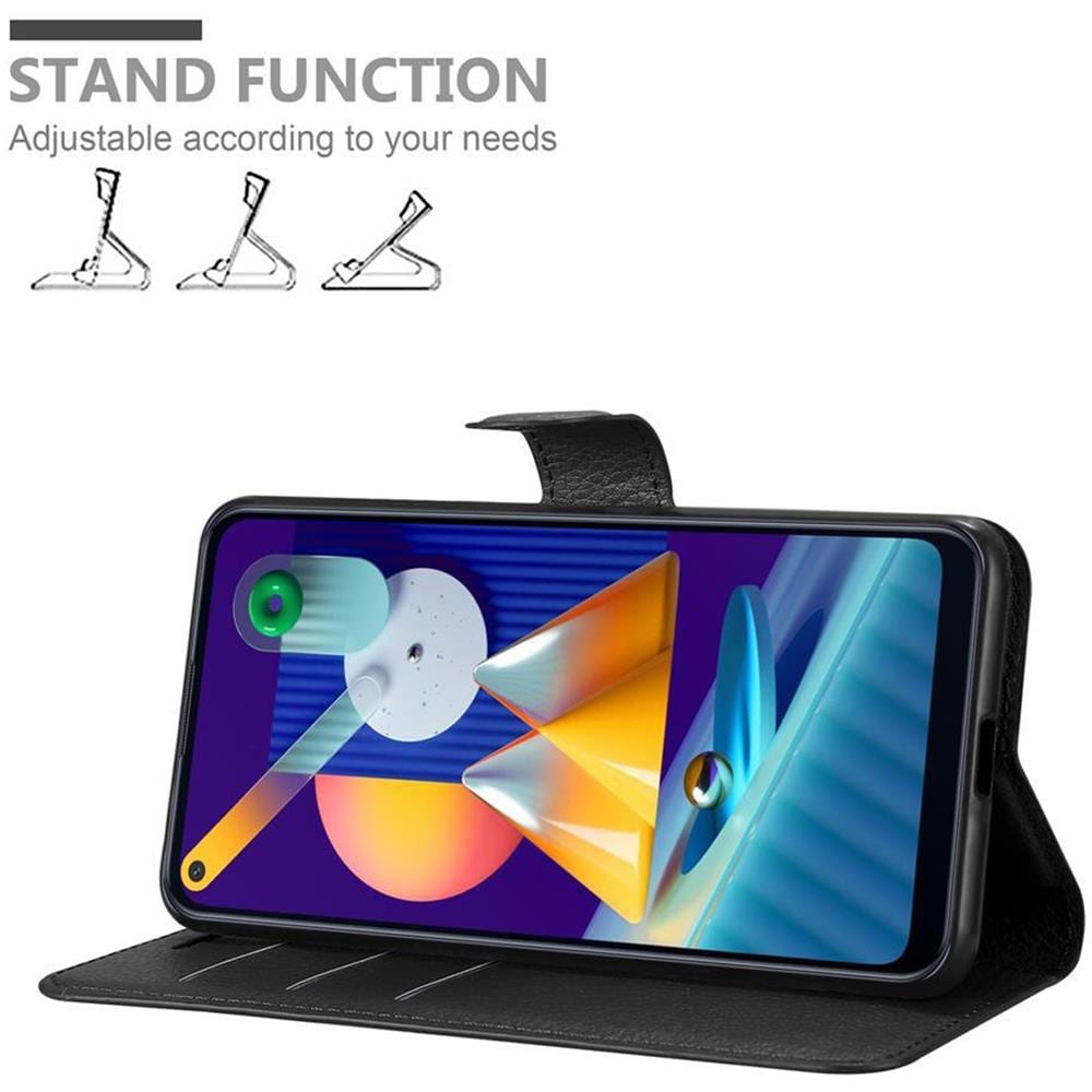 Custodia Compatibile Con Samsung Galaxy M11 In Nero Carbone - Coperchio Protettiva Con Chiusura Magnetica, Funzione Stand E Tasca Per Le Carte - Foto 2
