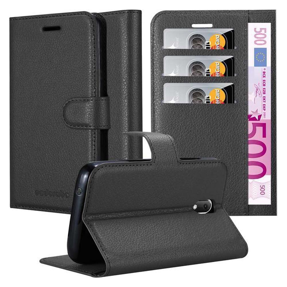 Custodia Compatibile Con Wiko Sunny 3 Mini In Nero Carbone - Coperchio Protettiva Con Chiusura Magnetica, Funzione Stand E Tasca Per Le Carte - Foto 1
