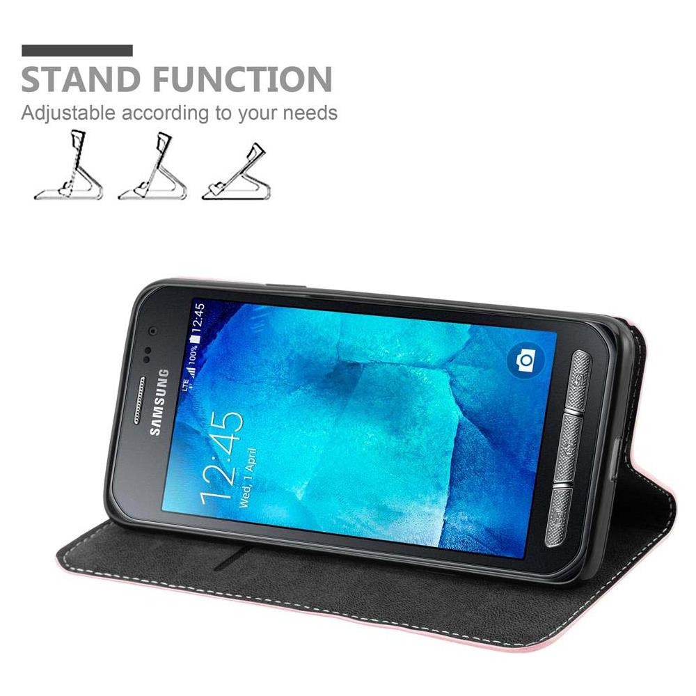 Custodia Compatibile Con Samsung Galaxy Xcover 3 In Oro Rosato Nero - Coperchio Protettiva Con Chiusura Magnetica, Funzione Stand E Tasca Per Le Carte - Foto 2