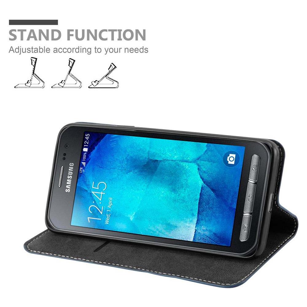 Cadorabo Custodia Compatibile Con Samsung Galaxy Xcover 3 In Blu Scuro Marrone - Coperchio Protettiva Con Chiusura Magnetica, Funzione Stand E Tasca Per Le Carte - Foto 2
