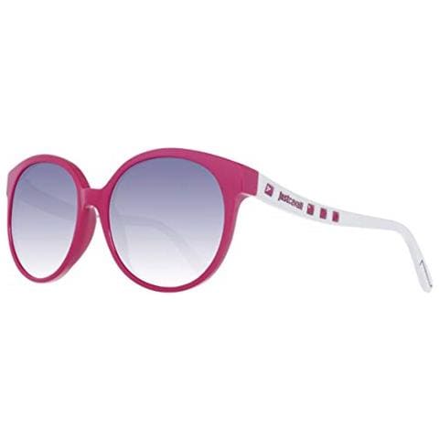 Una Mujer Con Gafas De Sol Y Un Fondo Morado. | Foto Premium